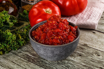 Diced ripe tomato with sauce