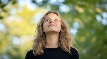 Fototapeta premium Girl looking up, nature, hope, summer