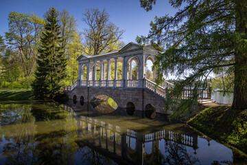 marble bridge in Catherine Park in the city of Pushkin near St. Petersburg on a clear spring morning