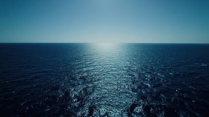 Obraz premium Ocean view, sunlit waves, clear sky, horizon, travel
