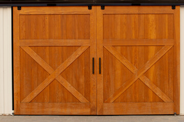 A view of a set of barn doors on a building. © DAVID