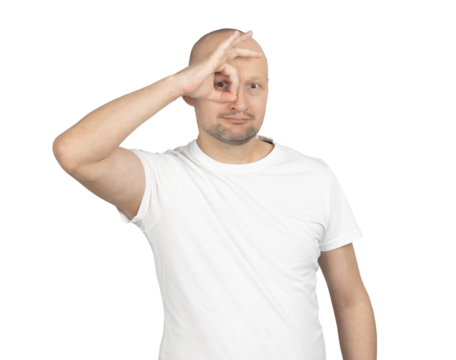 Man making an OK gesture over his eye like a monocle