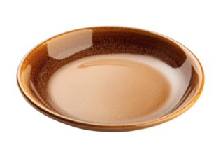 A brown ceramic plate with a clear glaze isolated on transparent background