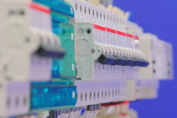 Circuit breakers to protect electrical loads in the electrical switchboard. Soft focus. Close-up. 