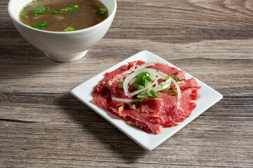 A view of a side of raw beef for pho.