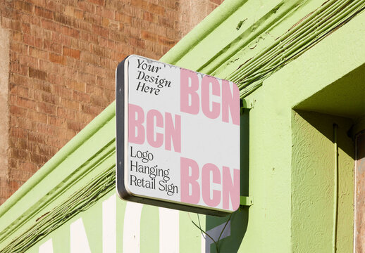 Hanging Sign on a Business Facade in Vibrant Barcelona