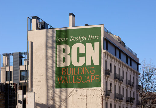 Building Wallscape Design mockup in the urban area of Barcelona under a clear blue sky.