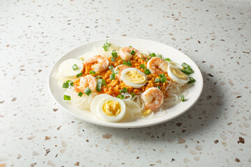 A view of a plate of pancit palabok.