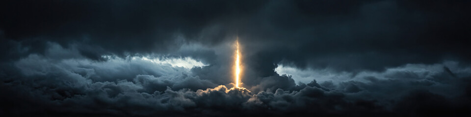 Obraz premium Vertical Light Beam Through Storm Clouds