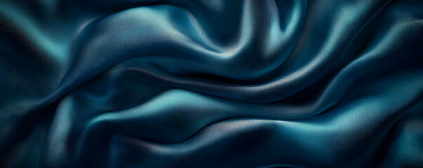 Fototapeta premium Teal silk fabric folds, dark background