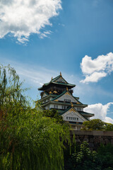 Vertical photograph of the frame of the reconstructed Osaka Castle, a Japanese castle located in Osaka, Japan.
