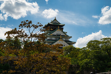 Frame photograph of the reconstructed Osaka Castle, a Japanese castle located in Osaka, Japan. 
