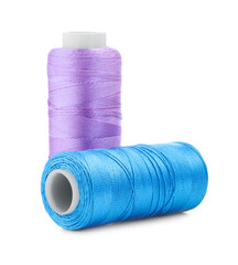 Spools of bright sewing threads isolated on white