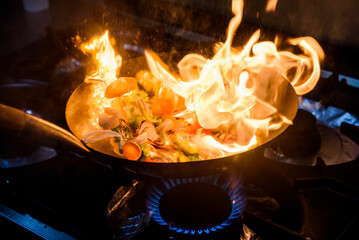 Preparing Asian food in the restaurant