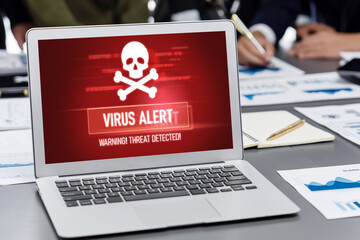 Virus warning alert on computer screen detected brisk cyber threat , hacker, computer virus and...