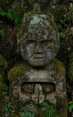 Obraz premium Statues of rakan (disciples of Buddha) of the Otagi Nenbutsu-ji temple, in Arashiyama in Kyoto. Japan