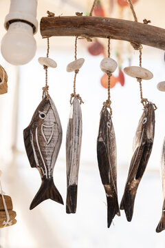 Local handmade fish-shaped mobile souvenir at a street vendor in Paros, Greece. 