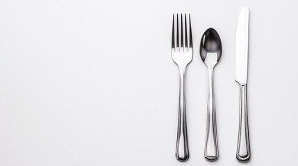 Elegant Cutlery Arrangement on White Background Featuring Fork, Spoon, and Knife in Minimalistic Style