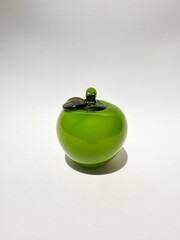 Green glass apple centered