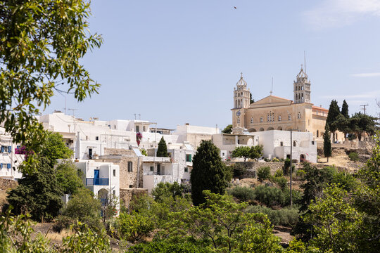 Landscape view of Paros village in Greece with traditional architecture and blue sky.
