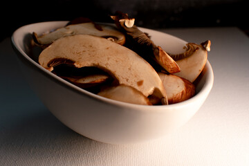 mushrooms, champignons raw in a plate