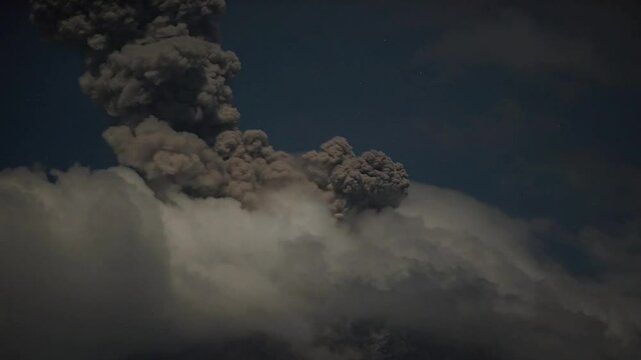 Volcanic lightning in ash clouds during eruption from of Colima volcano in Mexico.