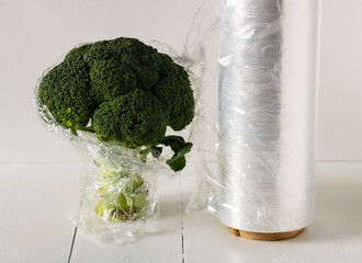 Fresh broccoli cabbage packed in transparent cling film
