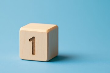Obraz premium Wooden cube with number one on blue background