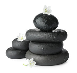 Stacked spa stones and beautiful flowers isolated on white
