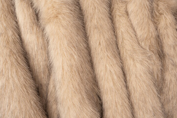 Texture of faux fur as a background, top view.