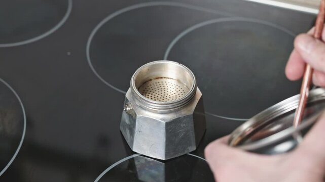 Explore the artistry of brewing coffee as water meets grounds, creating an aromatic experience in your kitchen.