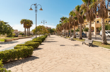 The promenade of Pozzallo on a sunny autumn day, located in the Free Municipal Consortium of Ragusa, is a popular seaside resort, Eastern Sicily, Italy