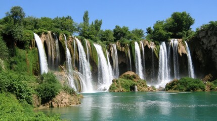 Fototapeta premium Majestic Waterfall Cascading Over Lush Green Cliffs
