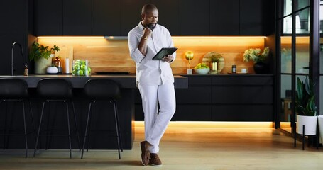 Mature, tablet and vision with black man in kitchen of home for recipe planning or research. App, menu and thinking with retired chef in modern apartment to search social media for meal inspiration