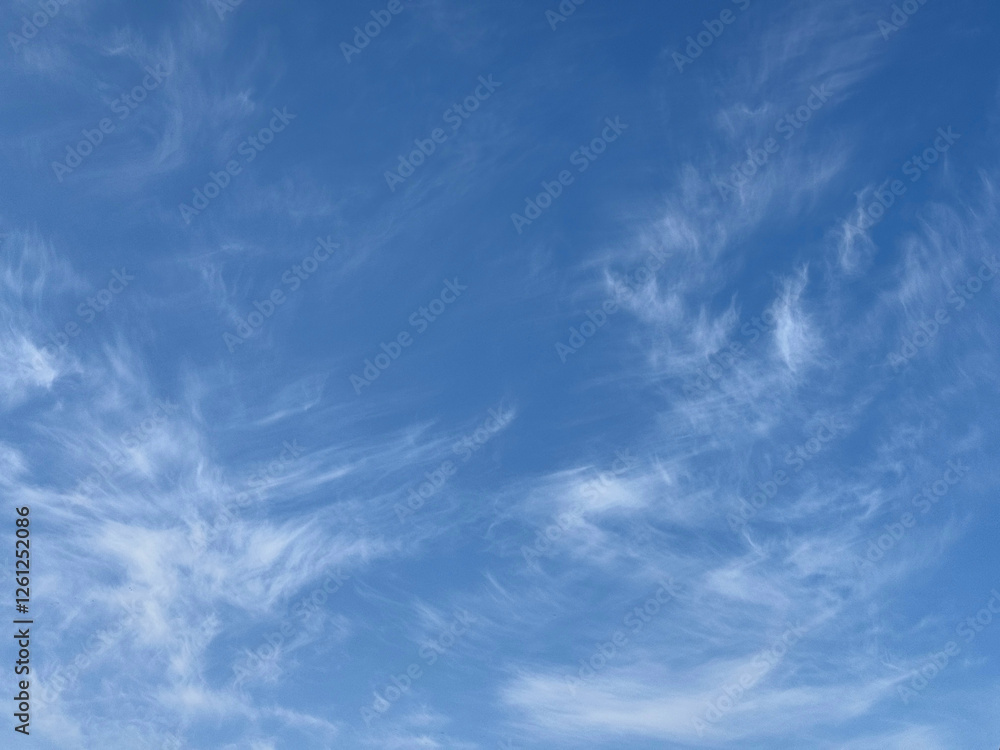 Poster Beautiful cirrus clouds in blue sky