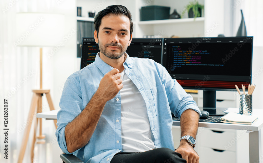 Poster profile's smart it developer looking camera to pose against on software development coding on two pc