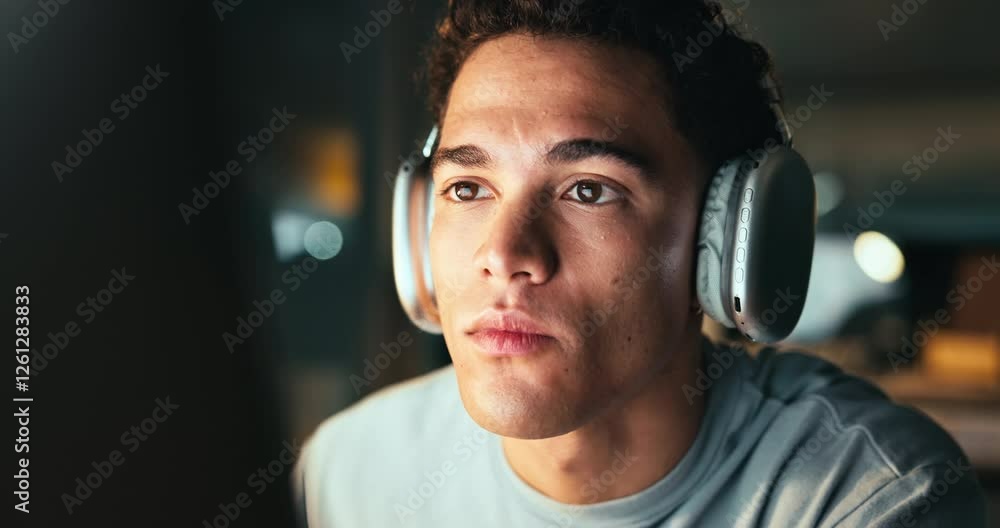 Leinwandbilder Man, night and headphones for work on computer in office, software developer and programming. Podcast, review html and listening to audio for web design deadline, cpu system update and streaming song