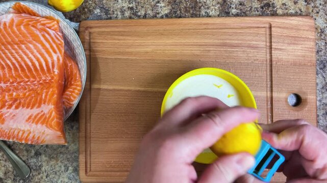 the process of salting salmon fish. lemon zest is