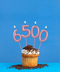 Candle number 6500 - Number of followers or likes.