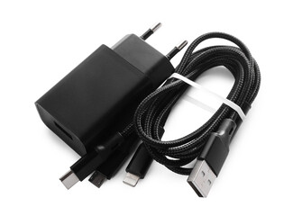 USB power adapter and triple charge cable isolated on white