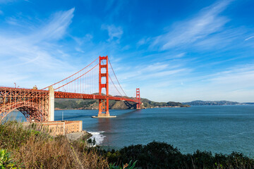 Surf in front of Golden Gate Bridge worldwide known symbol of California