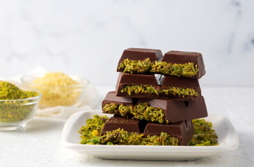 Dubai chocolate, milk chocolate filled with pistachio paste and kunefe
