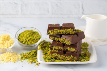 Dubai chocolate, milk chocolate filled with pistachio paste and kunefe