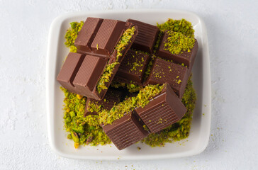 Dubai chocolate, milk chocolate filled with pistachio paste and kunefe