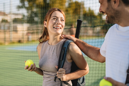 Two friends going to play tennis