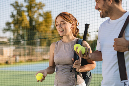 Two friends going to play tennis