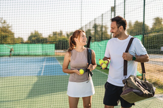 Two friends going to play tennis