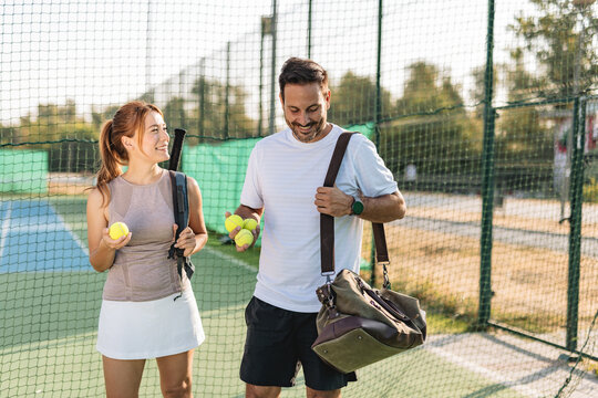 Two friends going to play tennis