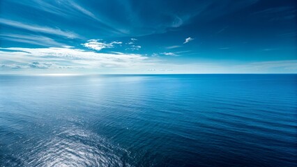Fototapeta premium Endless Calm Ocean Under Clear Blue Sky, Tranquil Horizon with Soft Gradients and Perfect Peaceful Reflection.