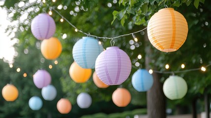 Obraz premium Colorful paper lanterns strung in a park at twilight. Possible use Festive event, outdoor party